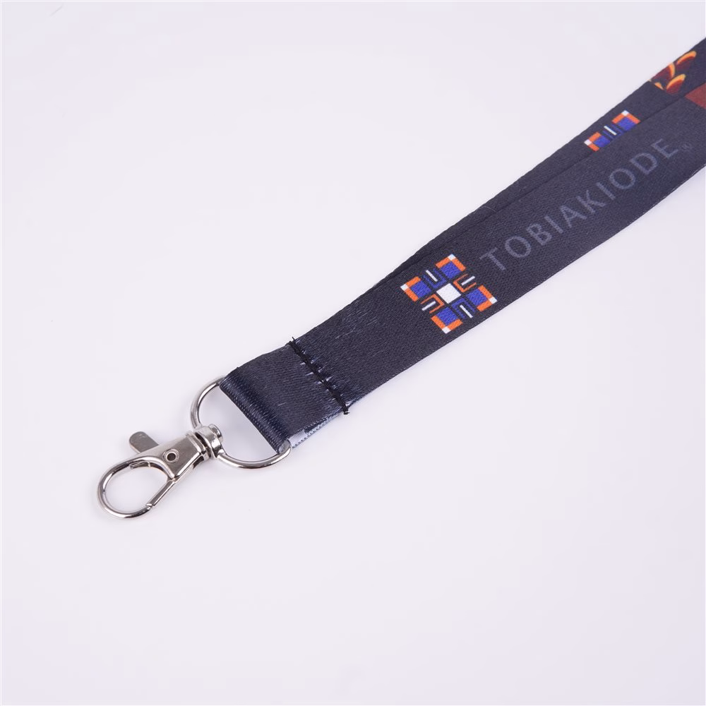Ember Geometry — branded tail and metal clasp close-up